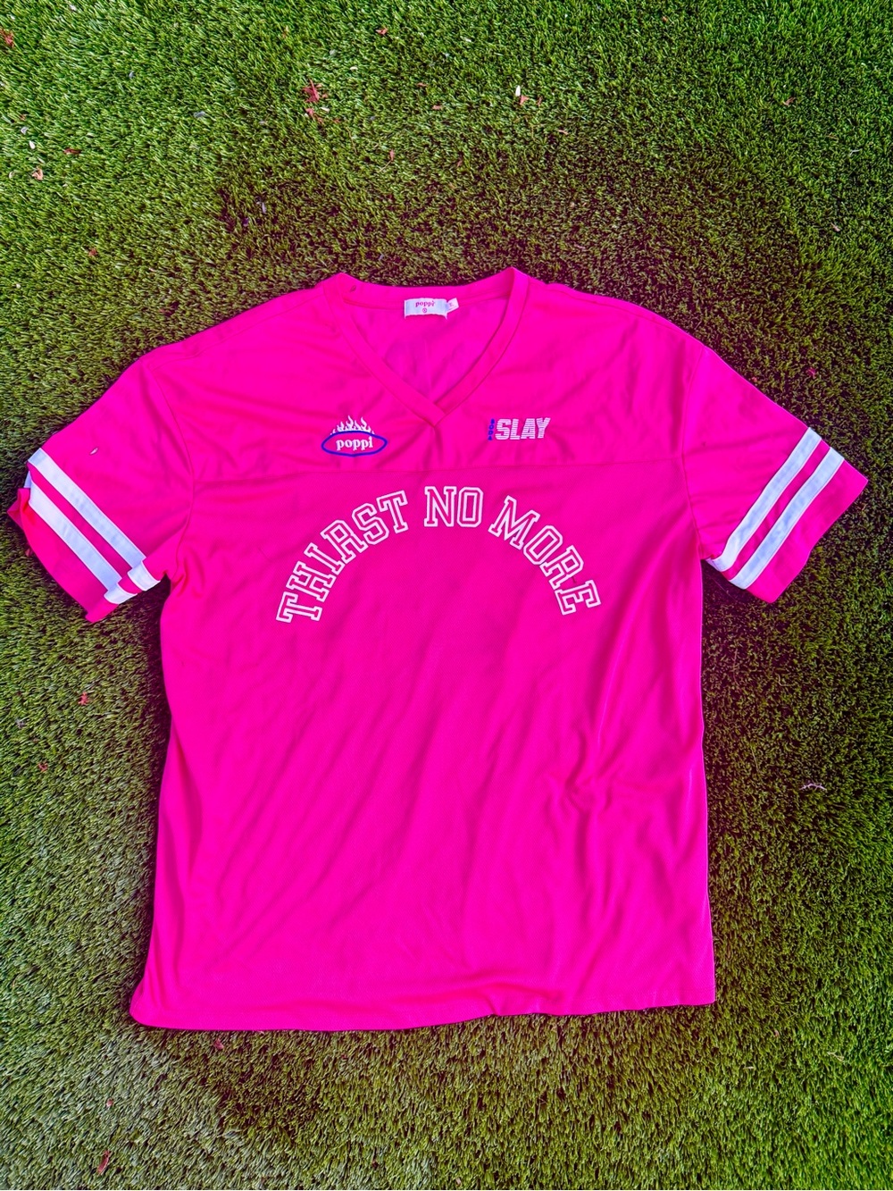 Official Poppi Women’s #25 ‘Thirst No More'  Hot Pink football jersey size XL.